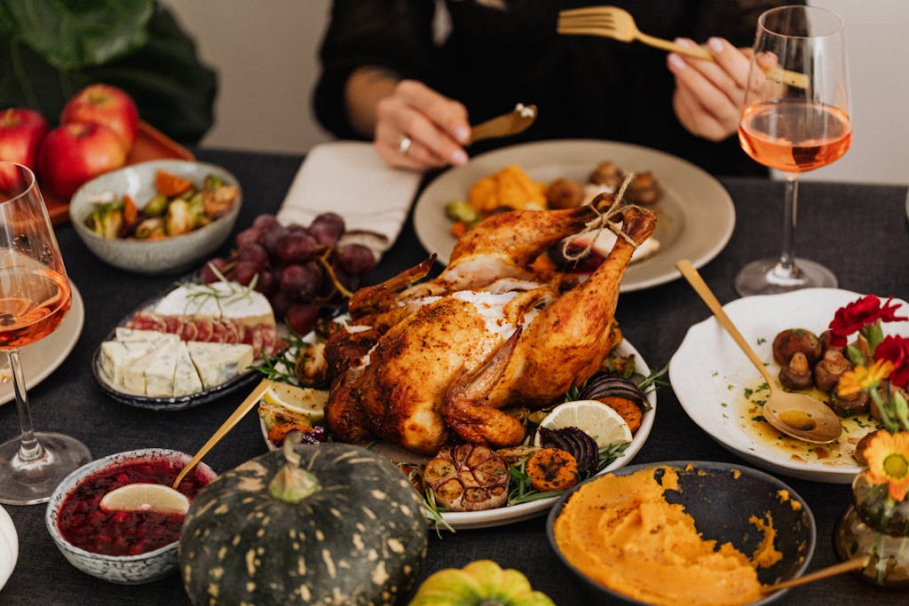Photo by Karolina Kaboompics | Motherhues Roasted Turkey on White Ceramic Plate