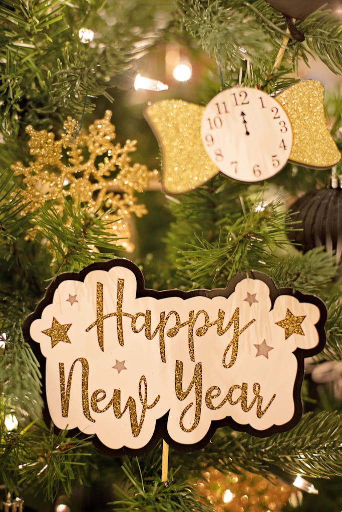 Photo by Jill Wellington | Motherhues Close-up of a beautiful New Year sign with festive Christmas decorations.